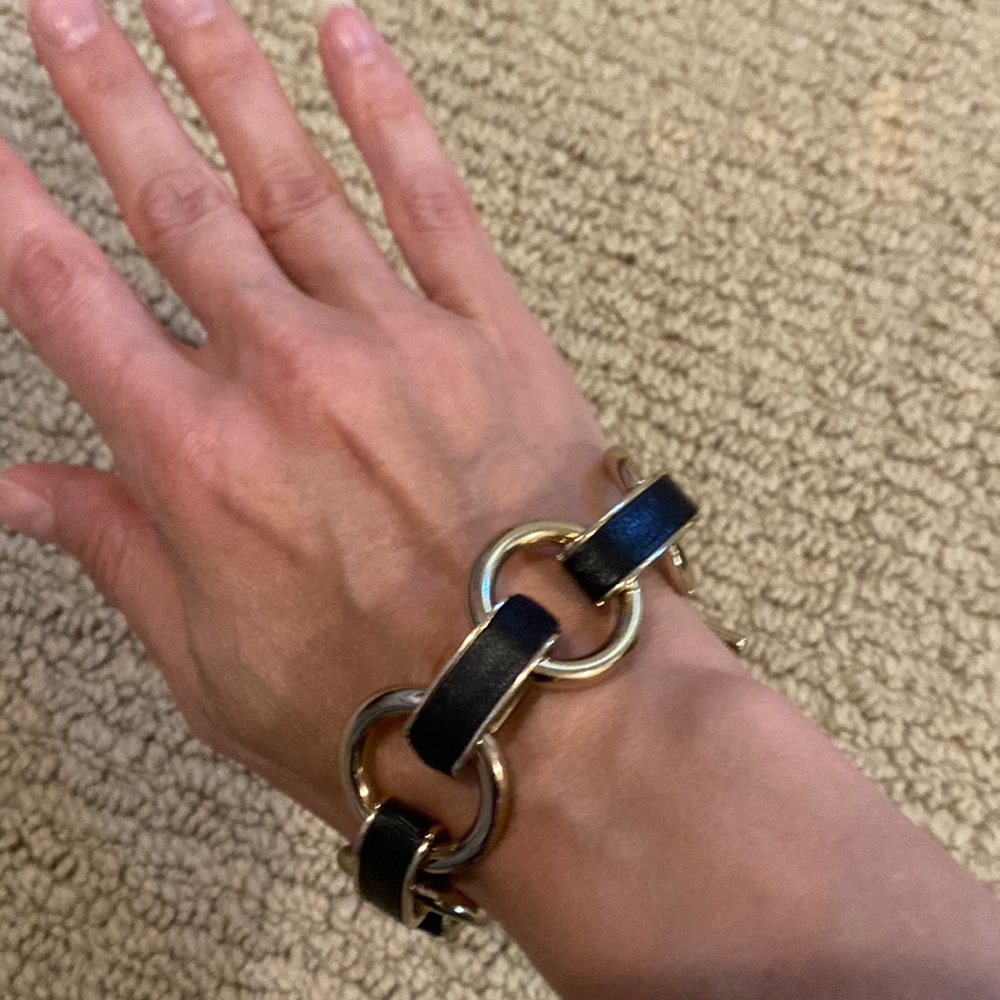 Cute JCrew fashion gold ring with black leather accent bracelet.